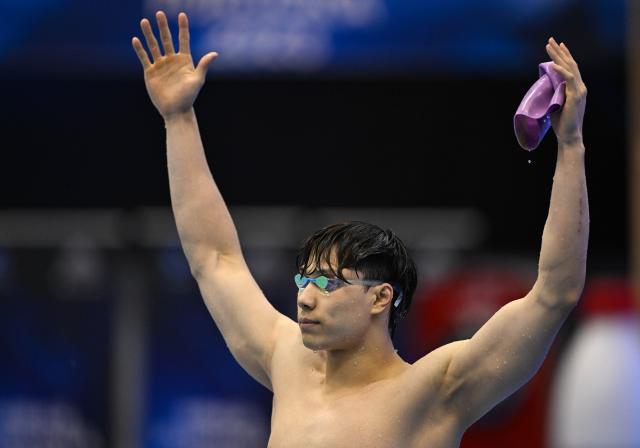 注册观看-世锦赛Day4：覃海洋问鼎50蛙 男女4X100混中国摘金